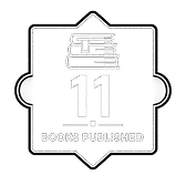 A badge with an icon of stacked books at the top, the number 11 in the center, and the words BOOKS PUBLISHED written below. The badge has a decorative border.