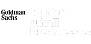 Goldman Sachs logo next to the text 10,000 small businesses in bold white letters on a light background.