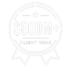 A circular badge with a star at the top, the text $500M+ Client Wins in the center, and two ribbon shapes at the bottom.