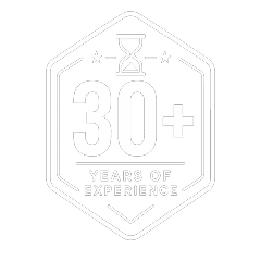 A hexagonal badge with an hourglass icon and the text “30+ Years of Experience” written inside, indicating over 30 years of expertise.